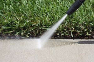 How to Clean Your Driveway or Sidewalk with a Pressure Washer